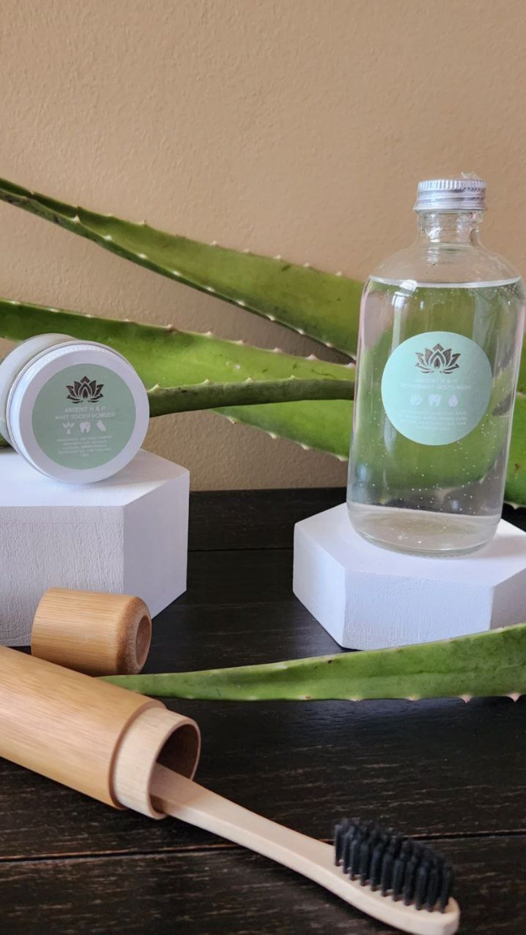 Complete oral health kit with natural tooth powder, peppermint mouthwash & a biodegradable bamboo toothbrush.