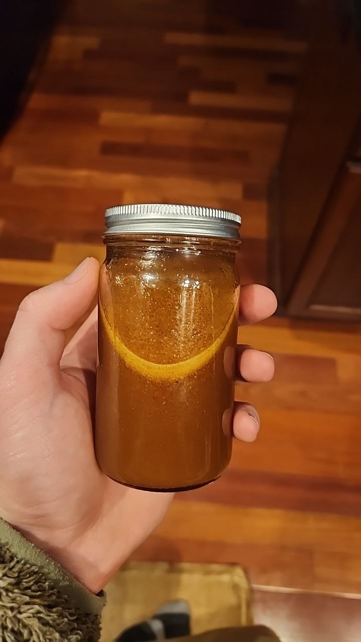 Natural cough & sore throat syrup with raw honey, ginger, and black seed oil for soothing relief.