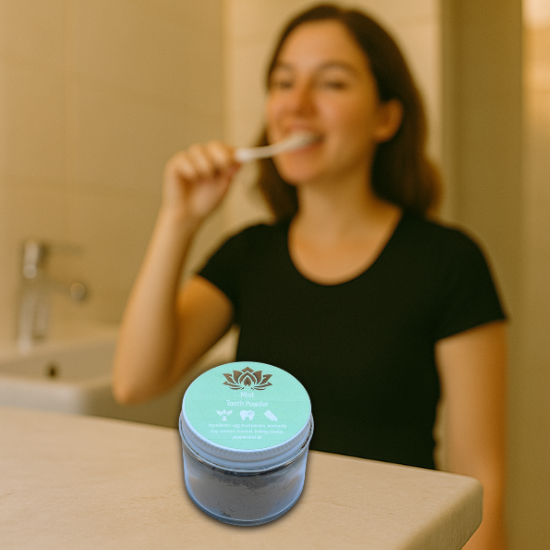 woman brushing teeth with remineralizing tooth powder