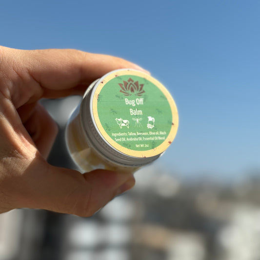 DEET-free bug-repelling tallow balm with beeswax, black seed oil & andiroba oil for all-natural protection.