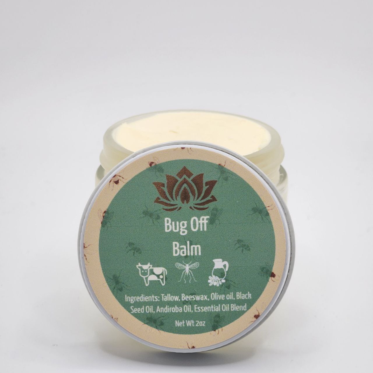 DEET-free bug-repelling tallow balm with beeswax, black seed oil & andiroba oil for all-natural protection.